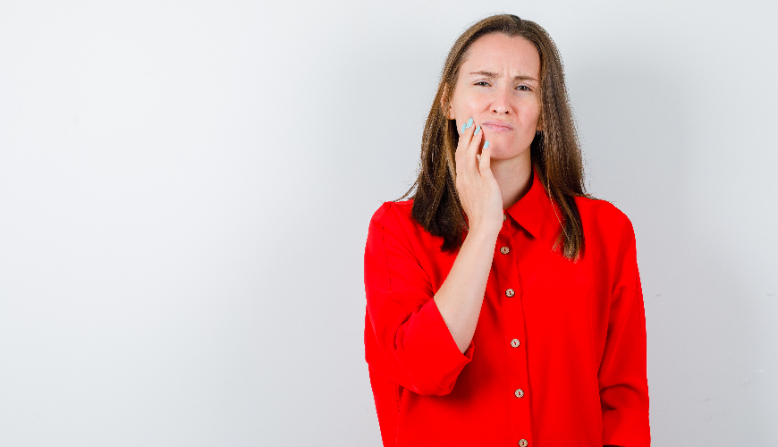 Boleče afte na dlesni in kako se jih znebiti